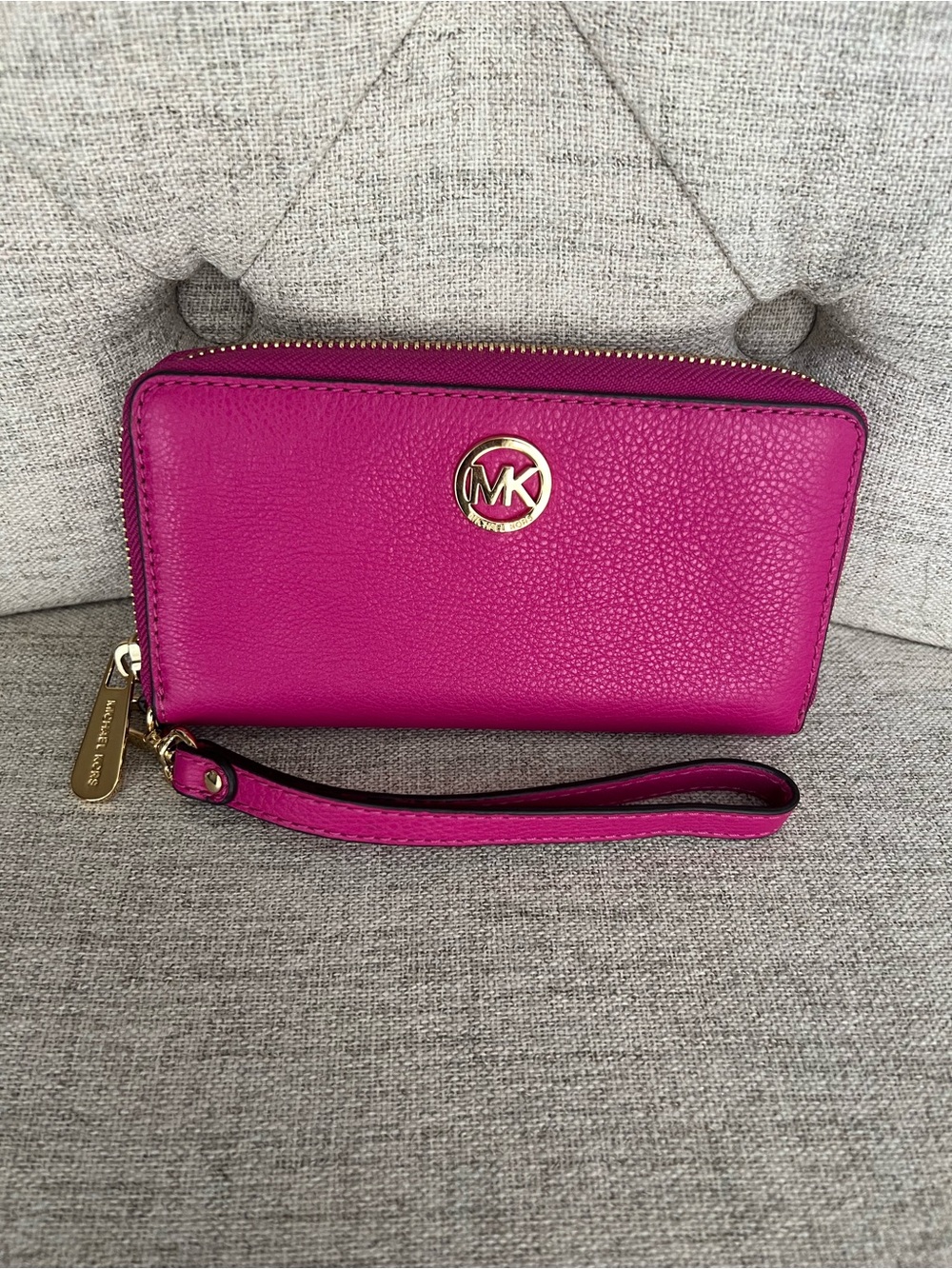 Michael Kors Fuchsia Pebbled Leather Wristlet with Gold MK Accent